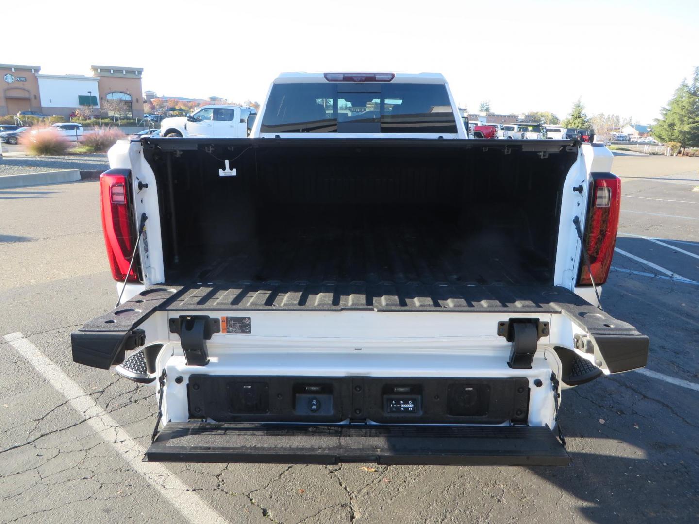 2024 White /Brown GMC Sierra 3500HD Crew Cab 4WD (1GT49YEYXRF) with an 6.6L V8 OHV 16V TURBO DIESEL engine, 10 Speed Automatic transmission, located at 2630 Grass Valley Highway, Auburn, CA, 95603, (530) 508-5100, 38.937893, -121.095482 - Must see Tow rig! - Photo#15