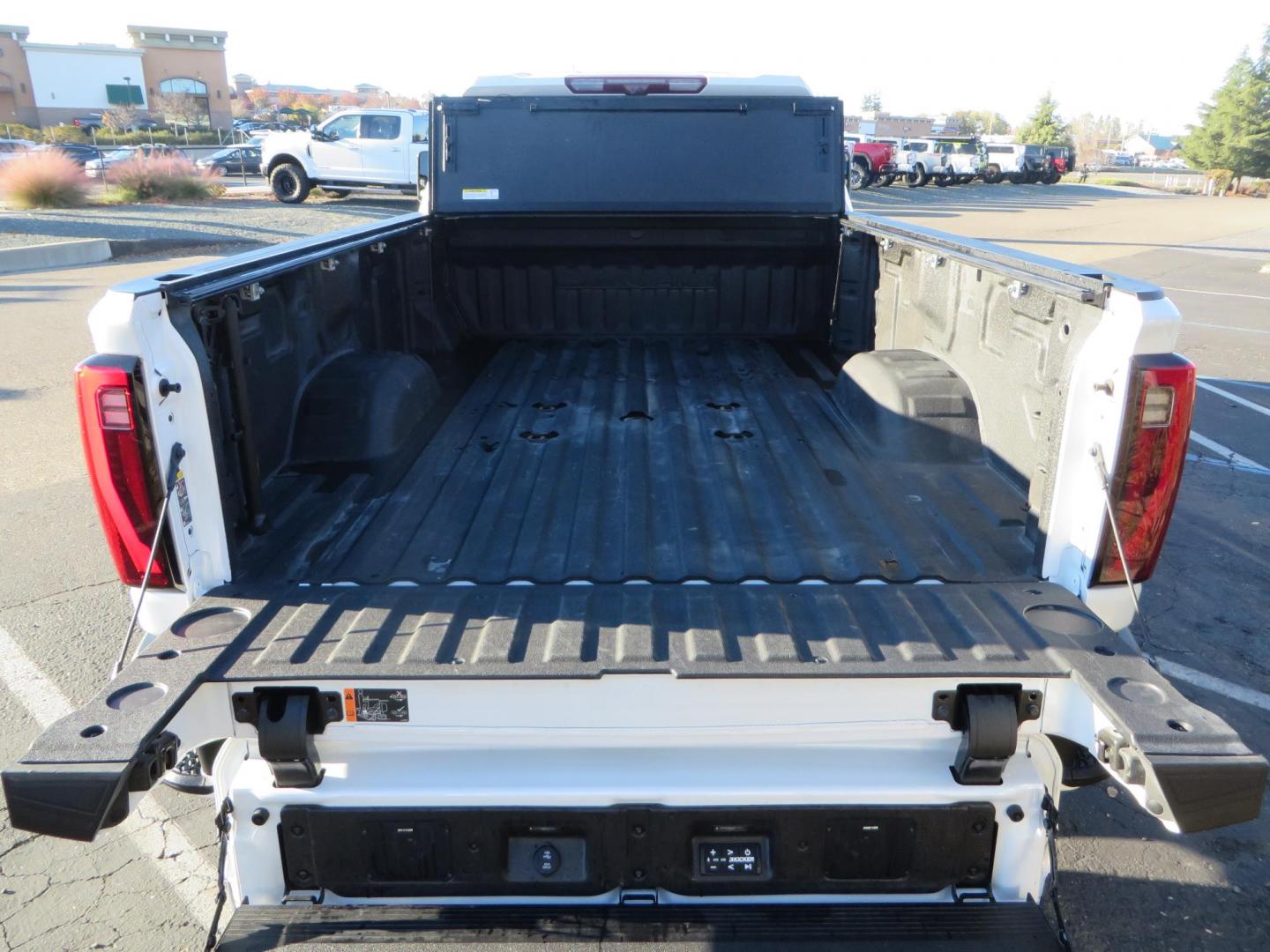 2024 White /Brown GMC Sierra 3500HD Crew Cab 4WD (1GT49YEYXRF) with an 6.6L V8 OHV 16V TURBO DIESEL engine, 10 Speed Automatic transmission, located at 2630 Grass Valley Highway, Auburn, CA, 95603, (530) 508-5100, 38.937893, -121.095482 - Must see Tow rig! - Photo#19