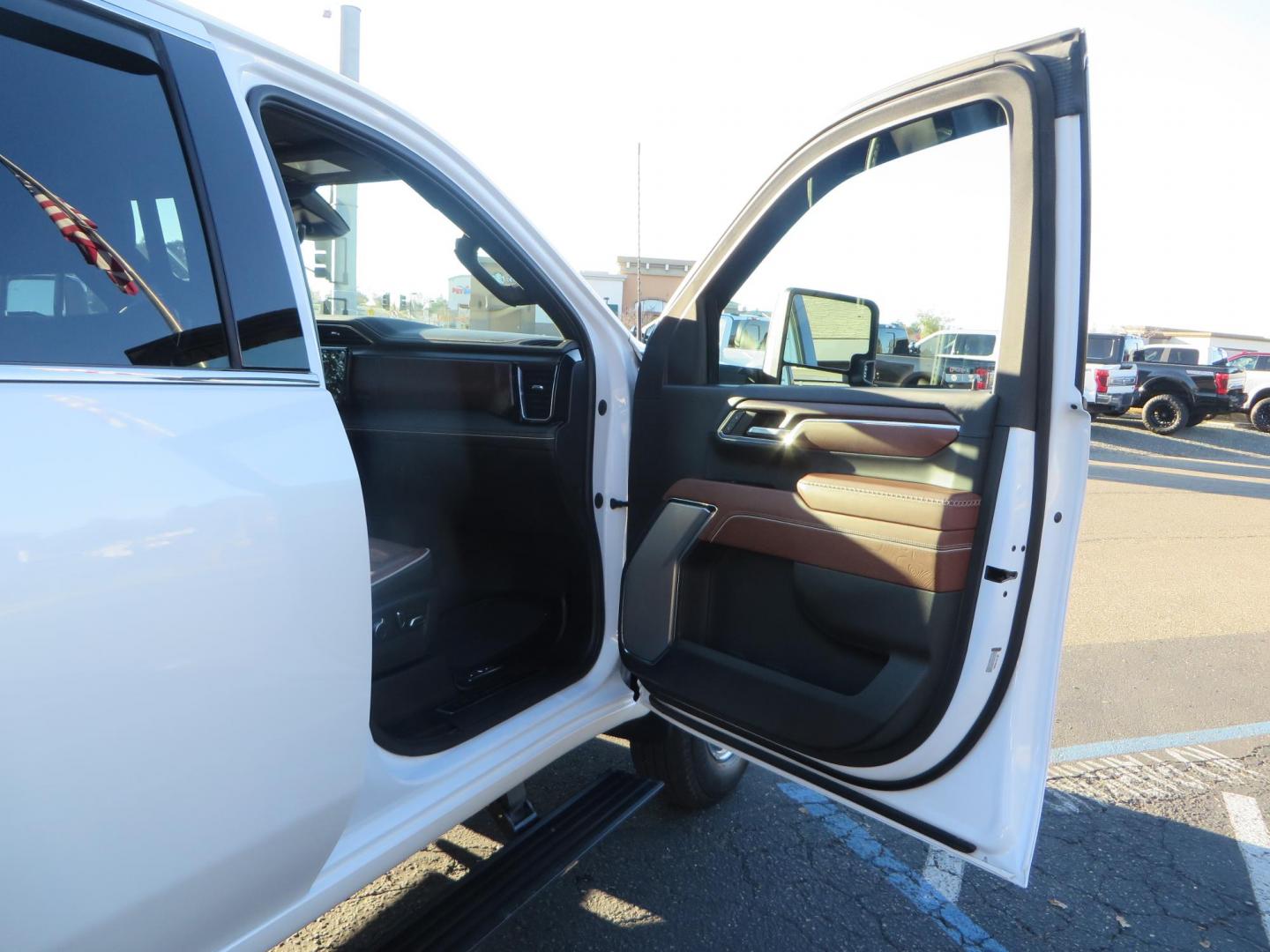 2024 White /Brown GMC Sierra 3500HD Crew Cab 4WD (1GT49YEYXRF) with an 6.6L V8 OHV 16V TURBO DIESEL engine, 10 Speed Automatic transmission, located at 2630 Grass Valley Highway, Auburn, CA, 95603, (530) 508-5100, 38.937893, -121.095482 - Must see Tow rig! - Photo#57