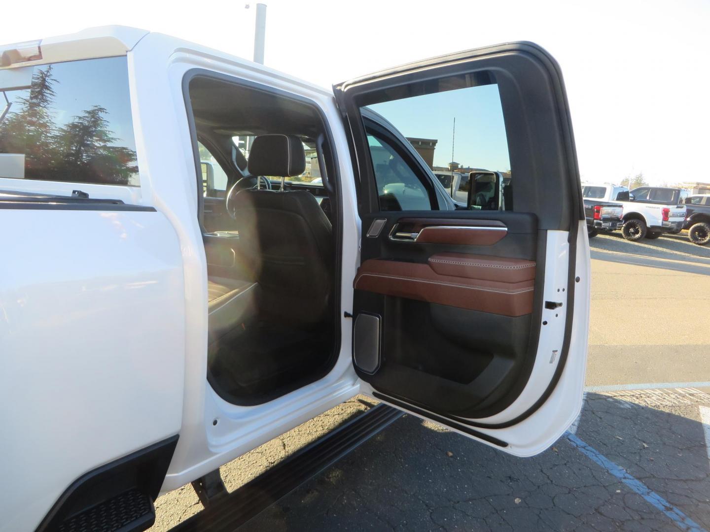 2024 White /Brown GMC Sierra 3500HD Crew Cab 4WD (1GT49YEYXRF) with an 6.6L V8 OHV 16V TURBO DIESEL engine, 10 Speed Automatic transmission, located at 2630 Grass Valley Highway, Auburn, CA, 95603, (530) 508-5100, 38.937893, -121.095482 - Must see Tow rig! - Photo#65
