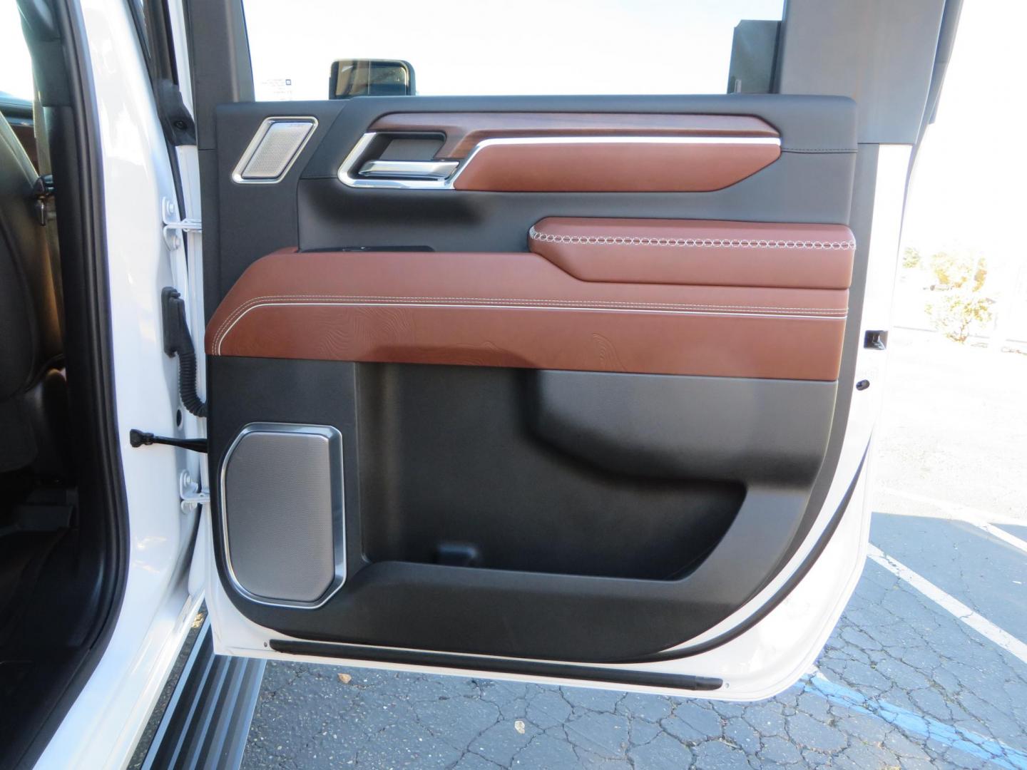 2024 White /Brown GMC Sierra 3500HD Crew Cab 4WD (1GT49YEYXRF) with an 6.6L V8 OHV 16V TURBO DIESEL engine, 10 Speed Automatic transmission, located at 2630 Grass Valley Highway, Auburn, CA, 95603, (530) 508-5100, 38.937893, -121.095482 - Must see Tow rig! - Photo#66