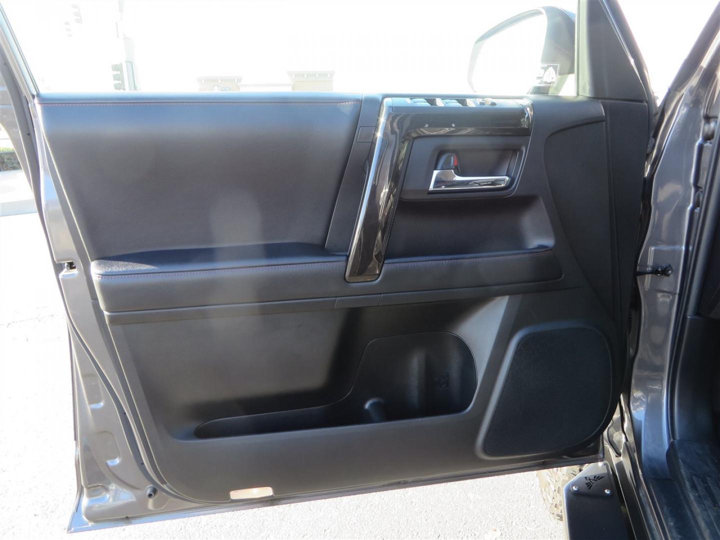 2021 grey /black Toyota 4Runner TRD Off-road Premium 4WD (JTERU5JR3M5) with an 4.0L V6 DOHC 24V engine, 5A transmission, located at 2630 Grass Valley Highway, Auburn, CA, 95603, (530) 508-5100, 38.937893, -121.095482 - Featuring Icon suspension, C4 front bumper, Victory 4x4 rear bumper with spare tire carrier, C4 ladder, Victory 4x4 roof rack, Victory 4x4 rock sliders, Baja designs LED's, 17'' KMC wheels, Maxxis Razr AT tires, and a Victory 4x4 rear cargo Molle panel. - Photo#23