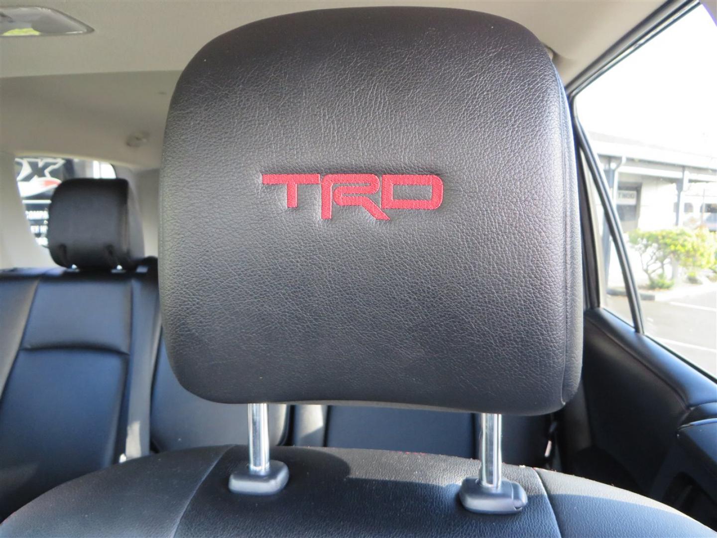 2021 grey /black Toyota 4Runner TRD Off-road Premium 4WD (JTERU5JR3M5) with an 4.0L V6 DOHC 24V engine, 5A transmission, located at 2630 Grass Valley Highway, Auburn, CA, 95603, (530) 508-5100, 38.937893, -121.095482 - Featuring Icon suspension, C4 front bumper, Victory 4x4 rear bumper with spare tire carrier, C4 ladder, Victory 4x4 roof rack, Victory 4x4 rock sliders, Baja designs LED's, 17'' KMC wheels, Maxxis Razr AT tires, and a Victory 4x4 rear cargo Molle panel. - Photo#27