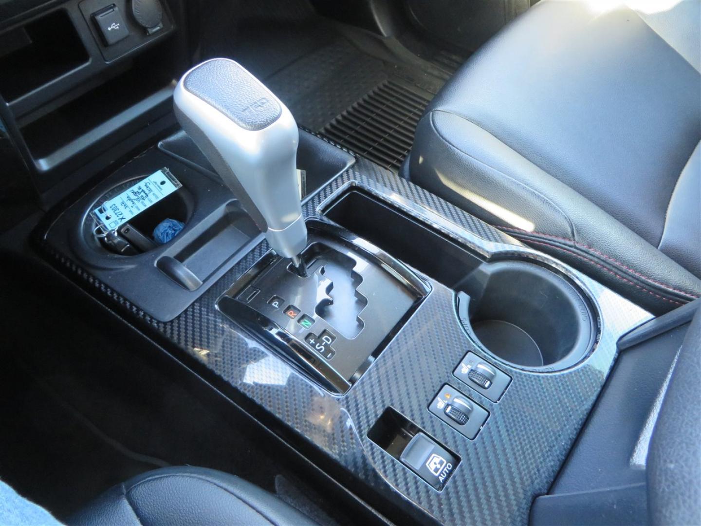 2021 grey /black Toyota 4Runner TRD Off-road Premium 4WD (JTERU5JR3M5) with an 4.0L V6 DOHC 24V engine, 5A transmission, located at 2630 Grass Valley Highway, Auburn, CA, 95603, (530) 508-5100, 38.937893, -121.095482 - Featuring Icon suspension, C4 front bumper, Victory 4x4 rear bumper with spare tire carrier, C4 ladder, Victory 4x4 roof rack, Victory 4x4 rock sliders, Baja designs LED's, 17'' KMC wheels, Maxxis Razr AT tires, and a Victory 4x4 rear cargo Molle panel. - Photo#36