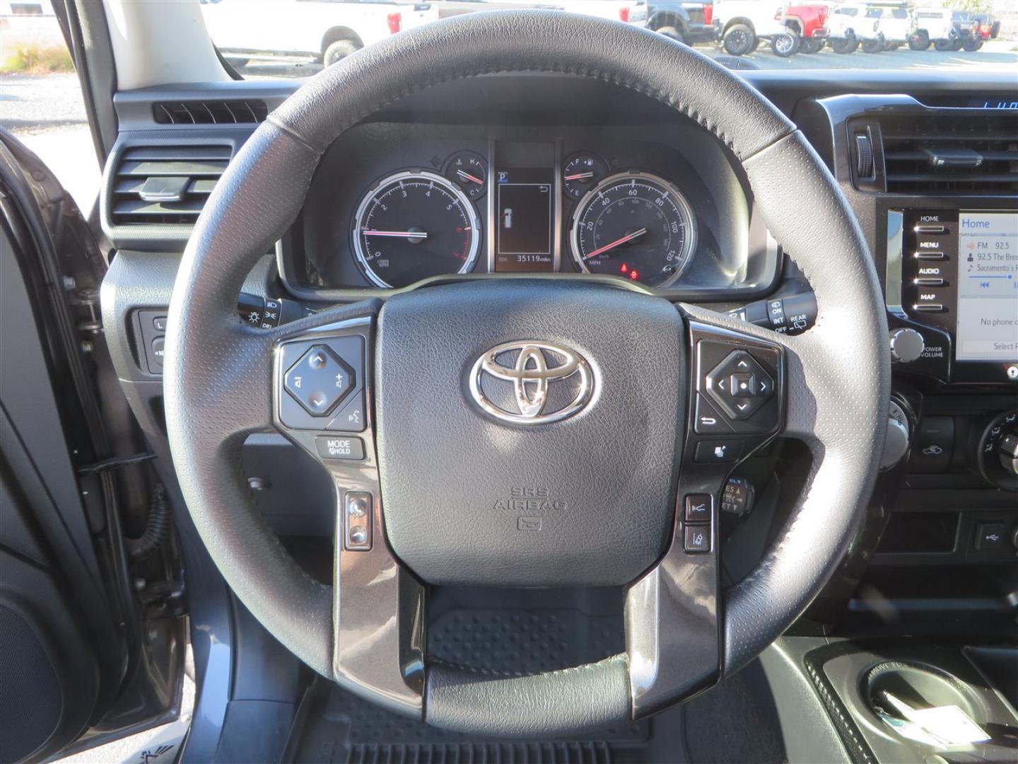2021 grey /black Toyota 4Runner TRD Off-road Premium 4WD (JTERU5JR3M5) with an 4.0L V6 DOHC 24V engine, 5A transmission, located at 2630 Grass Valley Highway, Auburn, CA, 95603, (530) 508-5100, 38.937893, -121.095482 - Featuring Icon suspension, C4 front bumper, Victory 4x4 rear bumper with spare tire carrier, C4 ladder, Victory 4x4 roof rack, Victory 4x4 rock sliders, Baja designs LED's, 17'' KMC wheels, Maxxis Razr AT tires, and a Victory 4x4 rear cargo Molle panel. - Photo#40