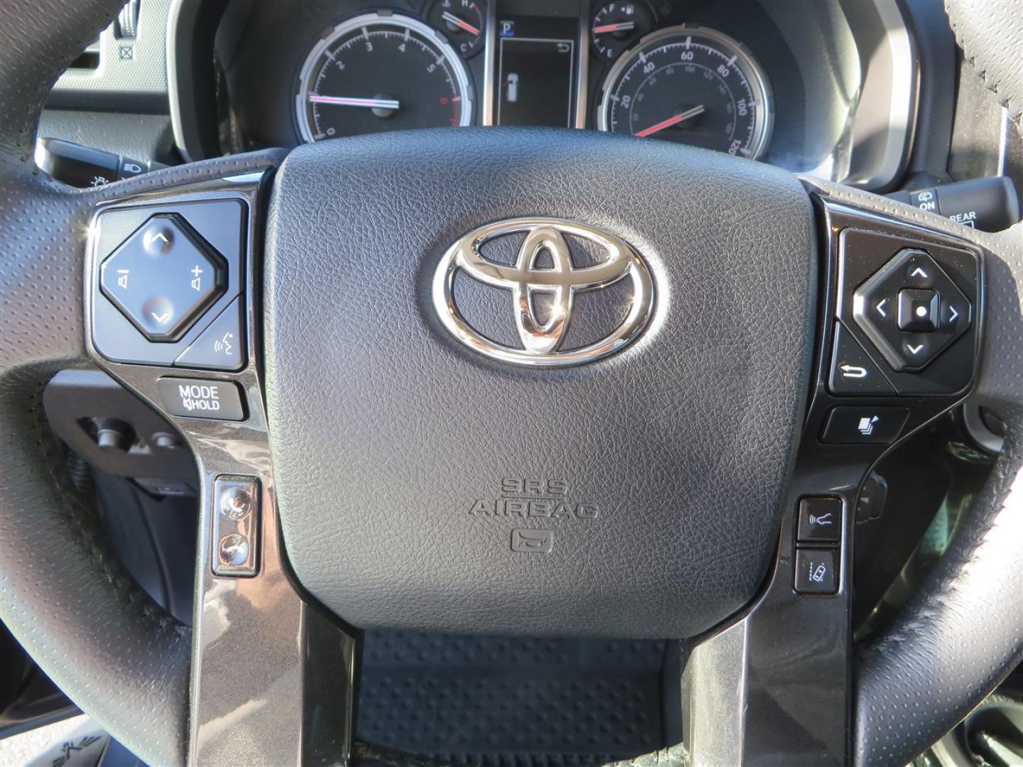 2021 grey /black Toyota 4Runner TRD Off-road Premium 4WD (JTERU5JR3M5) with an 4.0L V6 DOHC 24V engine, 5A transmission, located at 2630 Grass Valley Highway, Auburn, CA, 95603, (530) 508-5100, 38.937893, -121.095482 - Featuring Icon suspension, C4 front bumper, Victory 4x4 rear bumper with spare tire carrier, C4 ladder, Victory 4x4 roof rack, Victory 4x4 rock sliders, Baja designs LED's, 17'' KMC wheels, Maxxis Razr AT tires, and a Victory 4x4 rear cargo Molle panel. - Photo#41