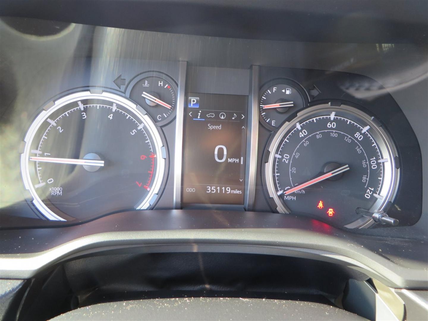 2021 grey /black Toyota 4Runner TRD Off-road Premium 4WD (JTERU5JR3M5) with an 4.0L V6 DOHC 24V engine, 5A transmission, located at 2630 Grass Valley Highway, Auburn, CA, 95603, (530) 508-5100, 38.937893, -121.095482 - Featuring Icon suspension, C4 front bumper, Victory 4x4 rear bumper with spare tire carrier, C4 ladder, Victory 4x4 roof rack, Victory 4x4 rock sliders, Baja designs LED's, 17'' KMC wheels, Maxxis Razr AT tires, and a Victory 4x4 rear cargo Molle panel. - Photo#42