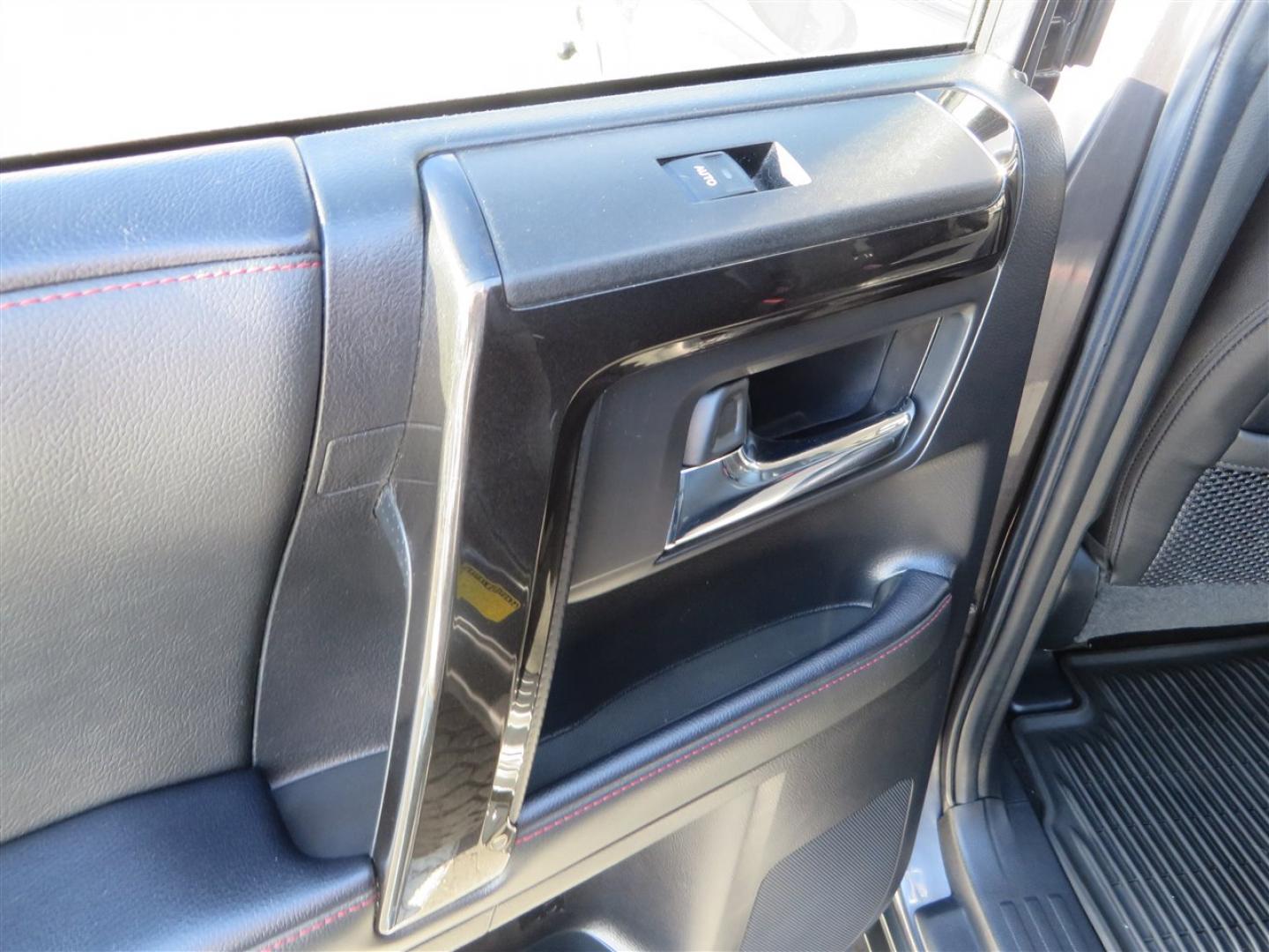 2021 grey /black Toyota 4Runner TRD Off-road Premium 4WD (JTERU5JR3M5) with an 4.0L V6 DOHC 24V engine, 5A transmission, located at 2630 Grass Valley Highway, Auburn, CA, 95603, (530) 508-5100, 38.937893, -121.095482 - Featuring Icon suspension, C4 front bumper, Victory 4x4 rear bumper with spare tire carrier, C4 ladder, Victory 4x4 roof rack, Victory 4x4 rock sliders, Baja designs LED's, 17'' KMC wheels, Maxxis Razr AT tires, and a Victory 4x4 rear cargo Molle panel. - Photo#47