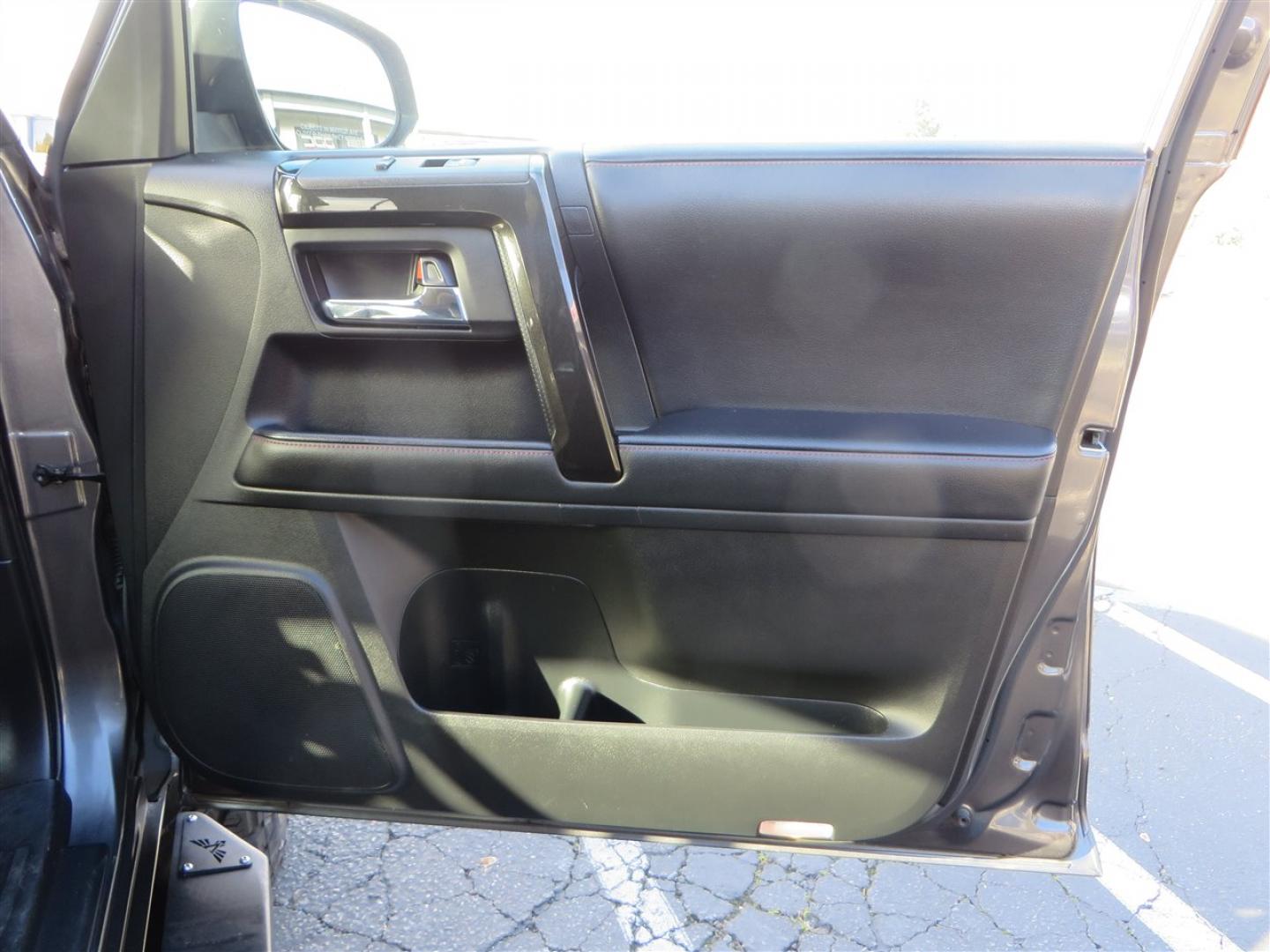 2021 grey /black Toyota 4Runner TRD Off-road Premium 4WD (JTERU5JR3M5) with an 4.0L V6 DOHC 24V engine, 5A transmission, located at 2630 Grass Valley Highway, Auburn, CA, 95603, (530) 508-5100, 38.937893, -121.095482 - Featuring Icon suspension, C4 front bumper, Victory 4x4 rear bumper with spare tire carrier, C4 ladder, Victory 4x4 roof rack, Victory 4x4 rock sliders, Baja designs LED's, 17'' KMC wheels, Maxxis Razr AT tires, and a Victory 4x4 rear cargo Molle panel. - Photo#55