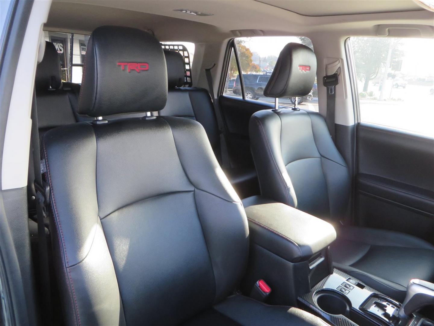 2021 grey /black Toyota 4Runner TRD Off-road Premium 4WD (JTERU5JR3M5) with an 4.0L V6 DOHC 24V engine, 5A transmission, located at 2630 Grass Valley Highway, Auburn, CA, 95603, (530) 508-5100, 38.937893, -121.095482 - Featuring Icon suspension, C4 front bumper, Victory 4x4 rear bumper with spare tire carrier, C4 ladder, Victory 4x4 roof rack, Victory 4x4 rock sliders, Baja designs LED's, 17'' KMC wheels, Maxxis Razr AT tires, and a Victory 4x4 rear cargo Molle panel. - Photo#58