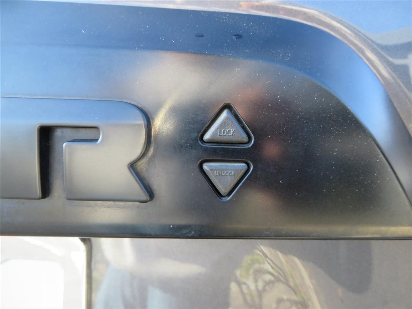 2021 grey /black Toyota 4Runner TRD Off-road Premium 4WD (JTERU5JR3M5) with an 4.0L V6 DOHC 24V engine, 5A transmission, located at 2630 Grass Valley Highway, Auburn, CA, 95603, (530) 508-5100, 38.937893, -121.095482 - Featuring Icon suspension, C4 front bumper, Victory 4x4 rear bumper with spare tire carrier, C4 ladder, Victory 4x4 roof rack, Victory 4x4 rock sliders, Baja designs LED's, 17'' KMC wheels, Maxxis Razr AT tires, and a Victory 4x4 rear cargo Molle panel. - Photo#67