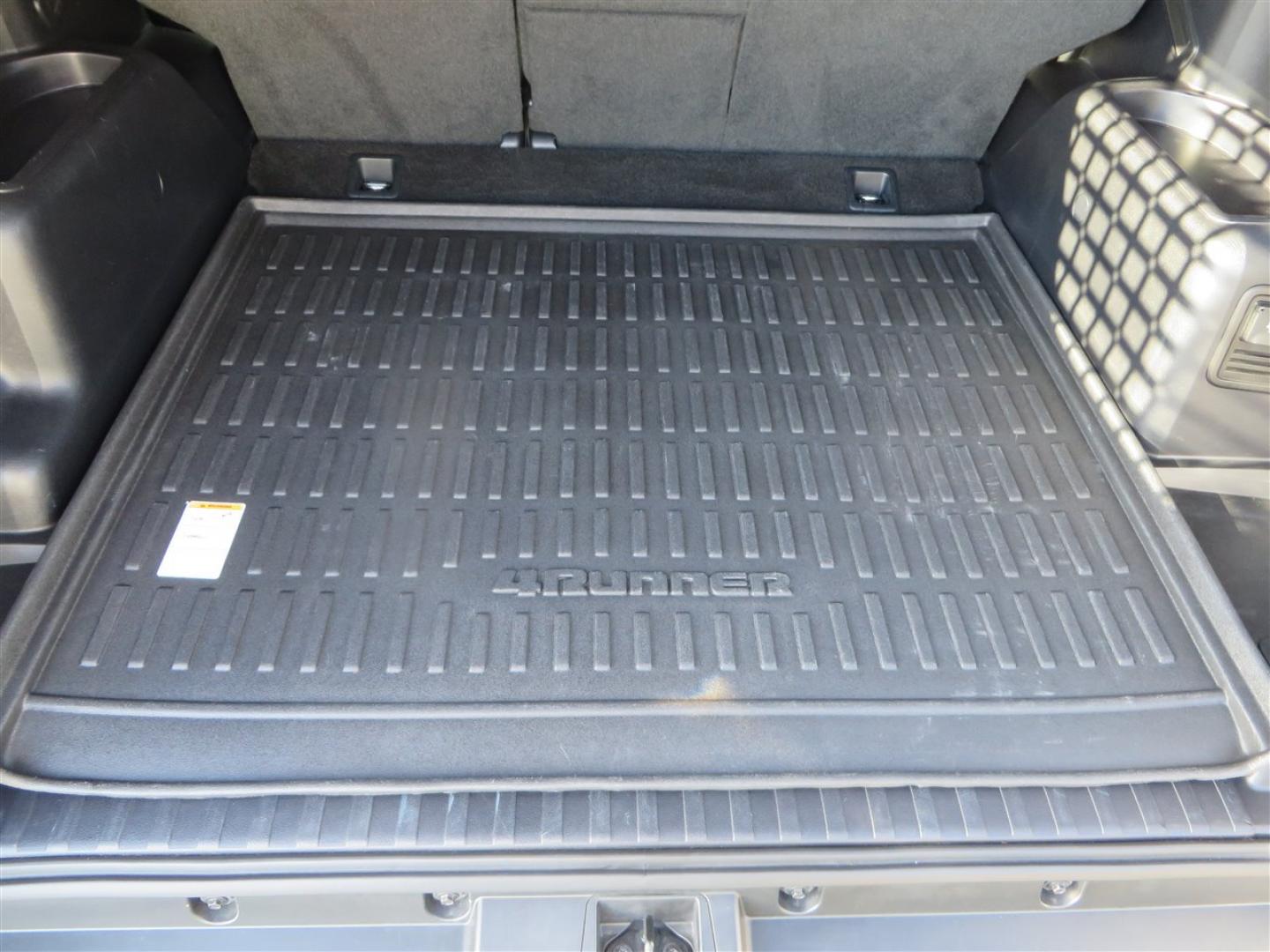 2021 grey /black Toyota 4Runner TRD Off-road Premium 4WD (JTERU5JR3M5) with an 4.0L V6 DOHC 24V engine, 5A transmission, located at 2630 Grass Valley Highway, Auburn, CA, 95603, (530) 508-5100, 38.937893, -121.095482 - Featuring Icon suspension, C4 front bumper, Victory 4x4 rear bumper with spare tire carrier, C4 ladder, Victory 4x4 roof rack, Victory 4x4 rock sliders, Baja designs LED's, 17'' KMC wheels, Maxxis Razr AT tires, and a Victory 4x4 rear cargo Molle panel. - Photo#71