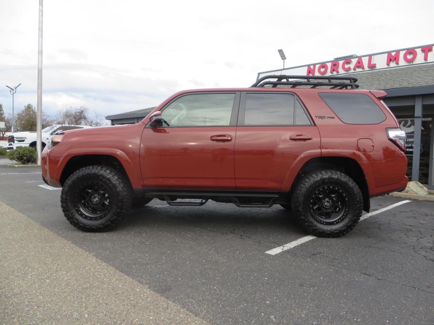 2024 Terracota /Black Toyota 4Runner TRD PRO 4WD (JTELU5JR0R6) with an 4.0L V6 DOHC 24V engine, 5A transmission, located at 2630 Grass Valley Highway, Auburn, CA, 95603, (530) 508-5100, 38.937893, -121.095482 - Features a Westcott level kit, 17'' Black Rhino Kelso wheels, Toyo RT Trail tires, and N-fab Predator running boards. - Photo#1