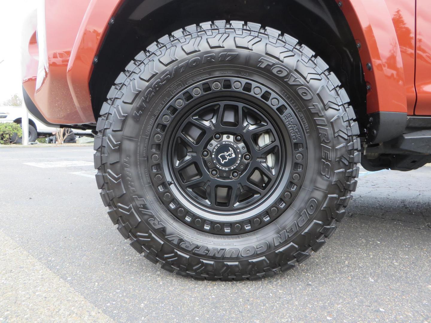 2024 Terracota /Black Toyota 4Runner TRD PRO 4WD (JTELU5JR0R6) with an 4.0L V6 DOHC 24V engine, 5A transmission, located at 2630 Grass Valley Highway, Auburn, CA, 95603, (530) 508-5100, 38.937893, -121.095482 - Features a Westcott level kit, 17'' Black Rhino Kelso wheels, Toyo RT Trail tires, and N-fab Predator running boards. - Photo#8