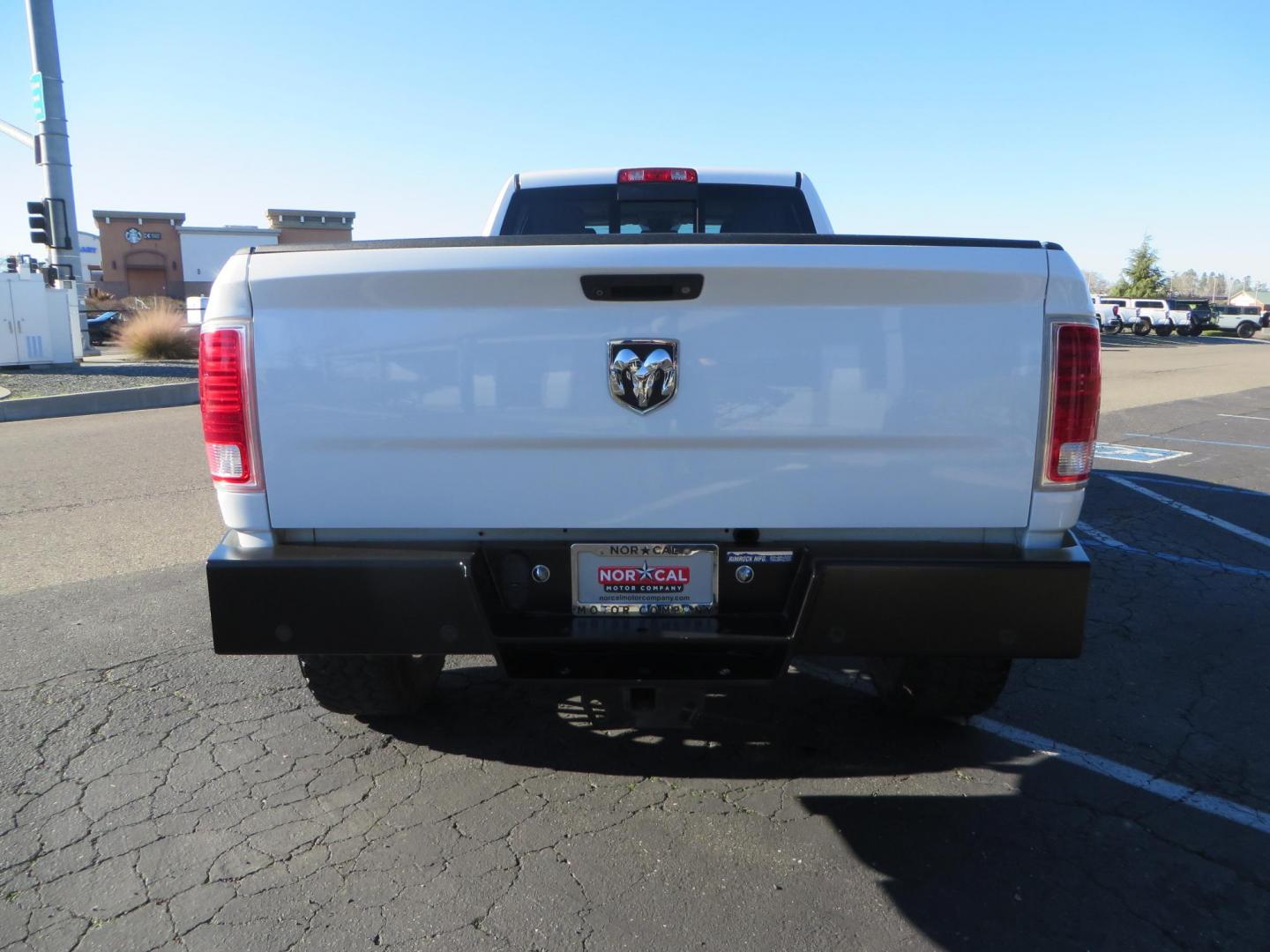 2015 White /Tan RAM 2500 Laramie Crew Cab LWB 4WD (3C6UR5KLXFG) with an 6.7L L6 OHV 24V TURBO DIESEL engine, 6-Speed Automatic transmission, located at 2630 Grass Valley Highway, Auburn, CA, 95603, (530) 508-5100, 38.937893, -121.095482 - Features- Thuren Suspension system, Fox 2.5 Performance Elite shocks, N-Fab runnign boards, Rimrock rear bumper, 20'' Fuel wheels, 35'' Nito Trail Grappler tires, Weathertech floor liners, and a Banks intake. - Photo#3