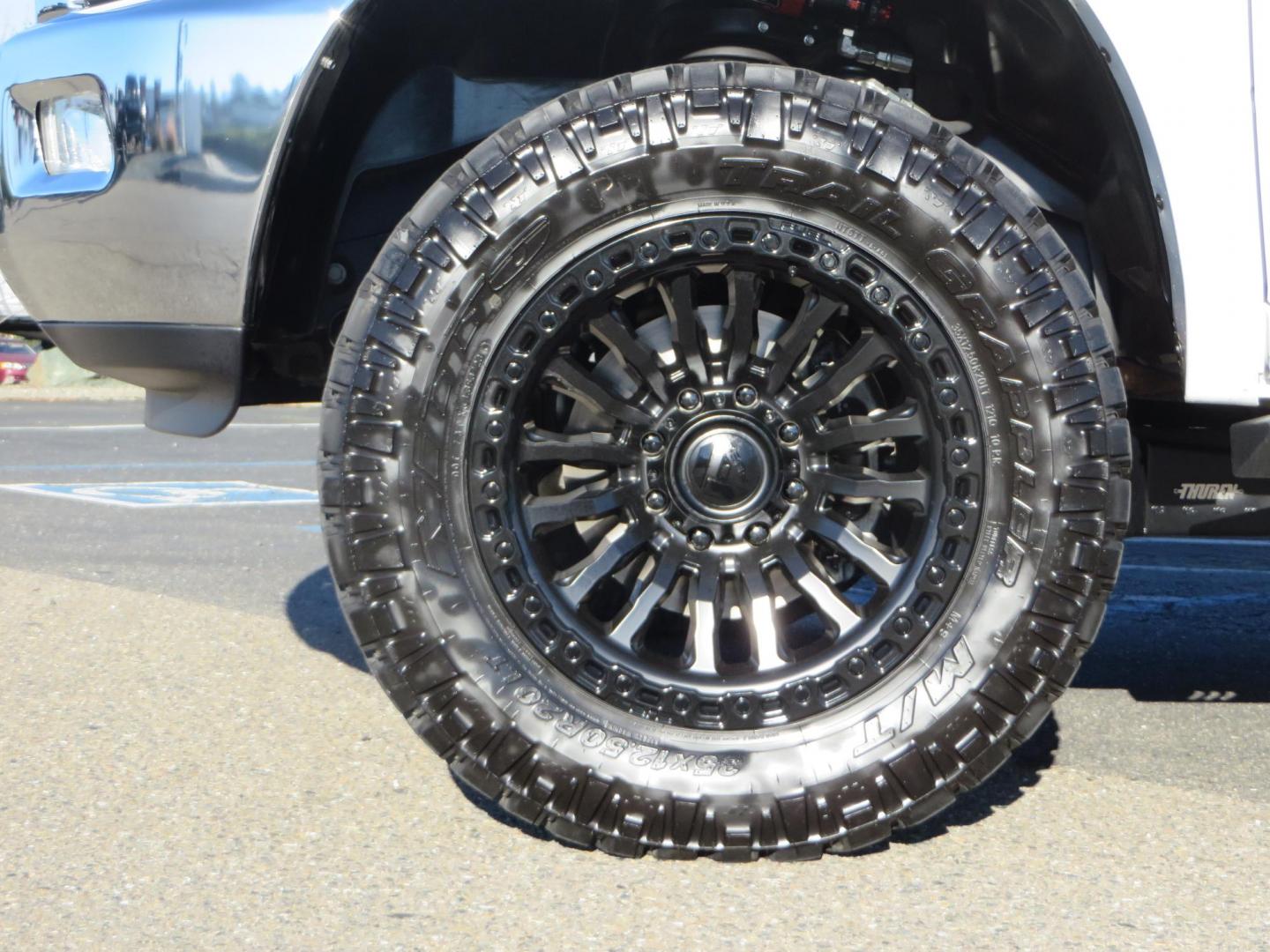 2015 White /Tan RAM 2500 Laramie Crew Cab LWB 4WD (3C6UR5KLXFG) with an 6.7L L6 OHV 24V TURBO DIESEL engine, 6-Speed Automatic transmission, located at 2630 Grass Valley Highway, Auburn, CA, 95603, (530) 508-5100, 38.937893, -121.095482 - Features- Thuren Suspension system, Fox 2.5 Performance Elite shocks, N-Fab runnign boards, Rimrock rear bumper, 20'' Fuel wheels, 35'' Nito Trail Grappler tires, Weathertech floor liners, and a Banks intake. - Photo#7