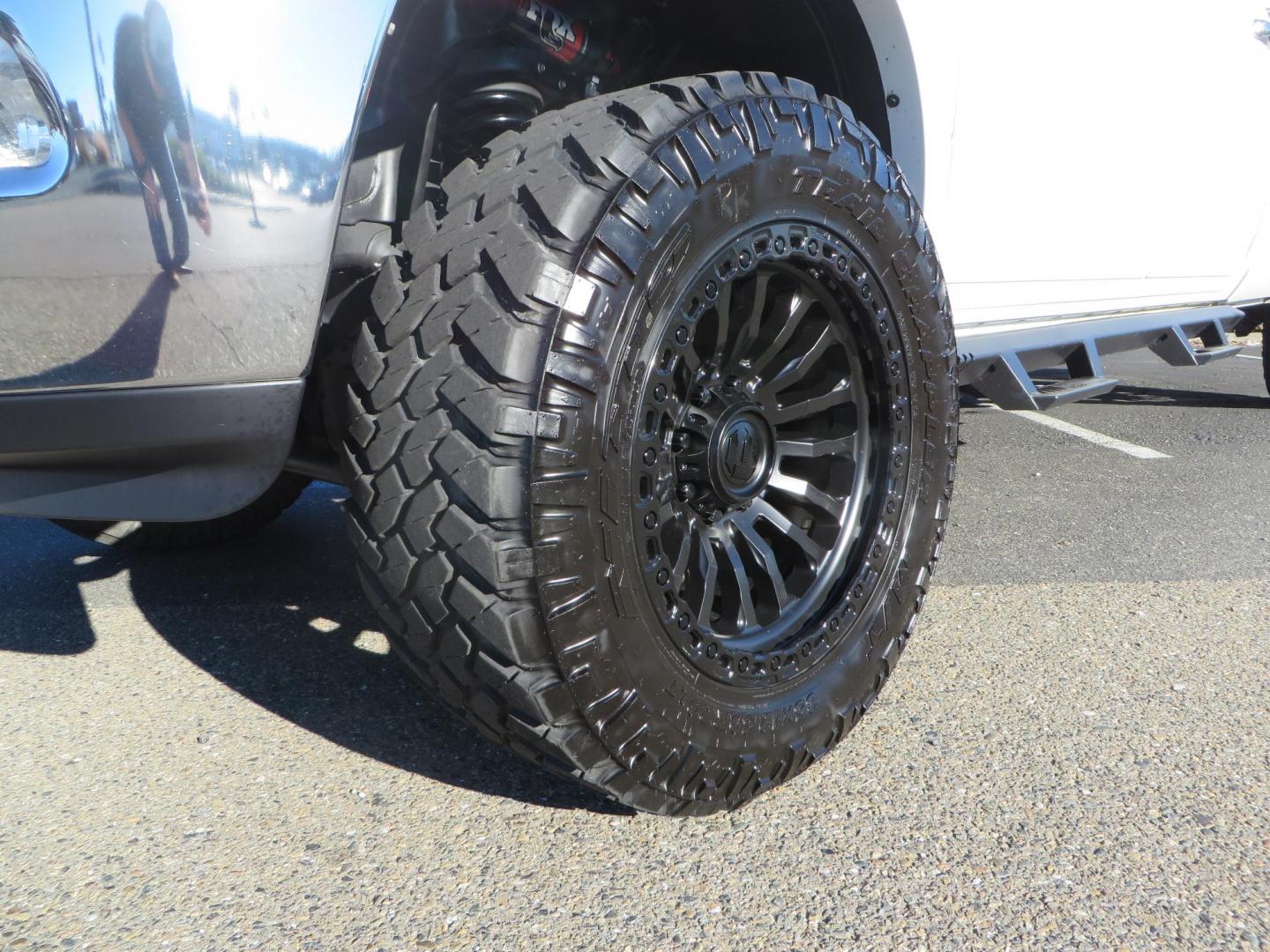 2015 White /Tan RAM 2500 Laramie Crew Cab LWB 4WD (3C6UR5KLXFG) with an 6.7L L6 OHV 24V TURBO DIESEL engine, 6-Speed Automatic transmission, located at 2630 Grass Valley Highway, Auburn, CA, 95603, (530) 508-5100, 38.937893, -121.095482 - Features- Thuren Suspension system, Fox 2.5 Performance Elite shocks, N-Fab runnign boards, Rimrock rear bumper, 20'' Fuel wheels, 35'' Nito Trail Grappler tires, Weathertech floor liners, and a Banks intake. - Photo#8