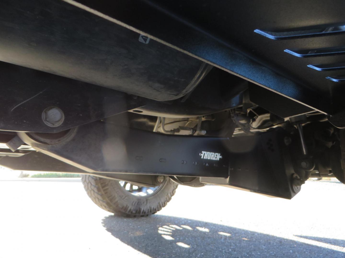 2015 White /Tan RAM 2500 Laramie Crew Cab LWB 4WD (3C6UR5KLXFG) with an 6.7L L6 OHV 24V TURBO DIESEL engine, 6-Speed Automatic transmission, located at 2630 Grass Valley Highway, Auburn, CA, 95603, (530) 508-5100, 38.937893, -121.095482 - Features- Thuren Suspension system, Fox 2.5 Performance Elite shocks, N-Fab runnign boards, Rimrock rear bumper, 20'' Fuel wheels, 35'' Nito Trail Grappler tires, Weathertech floor liners, and a Banks intake. - Photo#11