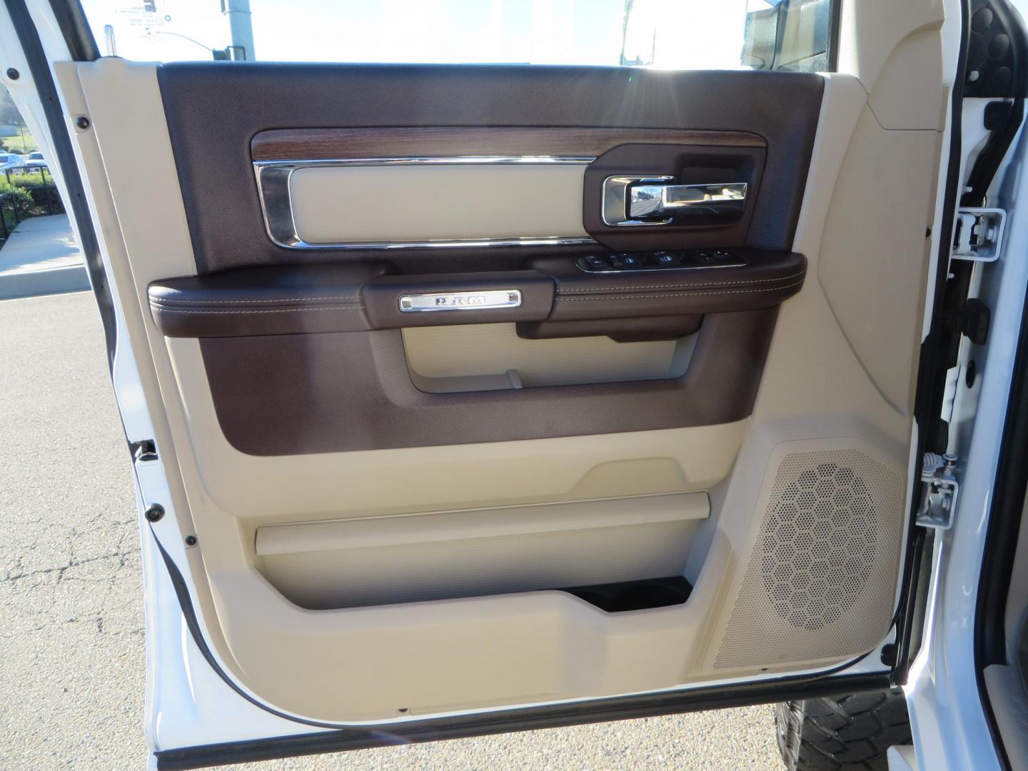 2015 White /Tan RAM 2500 Laramie Crew Cab LWB 4WD (3C6UR5KLXFG) with an 6.7L L6 OHV 24V TURBO DIESEL engine, 6-Speed Automatic transmission, located at 2630 Grass Valley Highway, Auburn, CA, 95603, (530) 508-5100, 38.937893, -121.095482 - Features- Thuren Suspension system, Fox 2.5 Performance Elite shocks, N-Fab runnign boards, Rimrock rear bumper, 20'' Fuel wheels, 35'' Nito Trail Grappler tires, Weathertech floor liners, and a Banks intake. - Photo#19