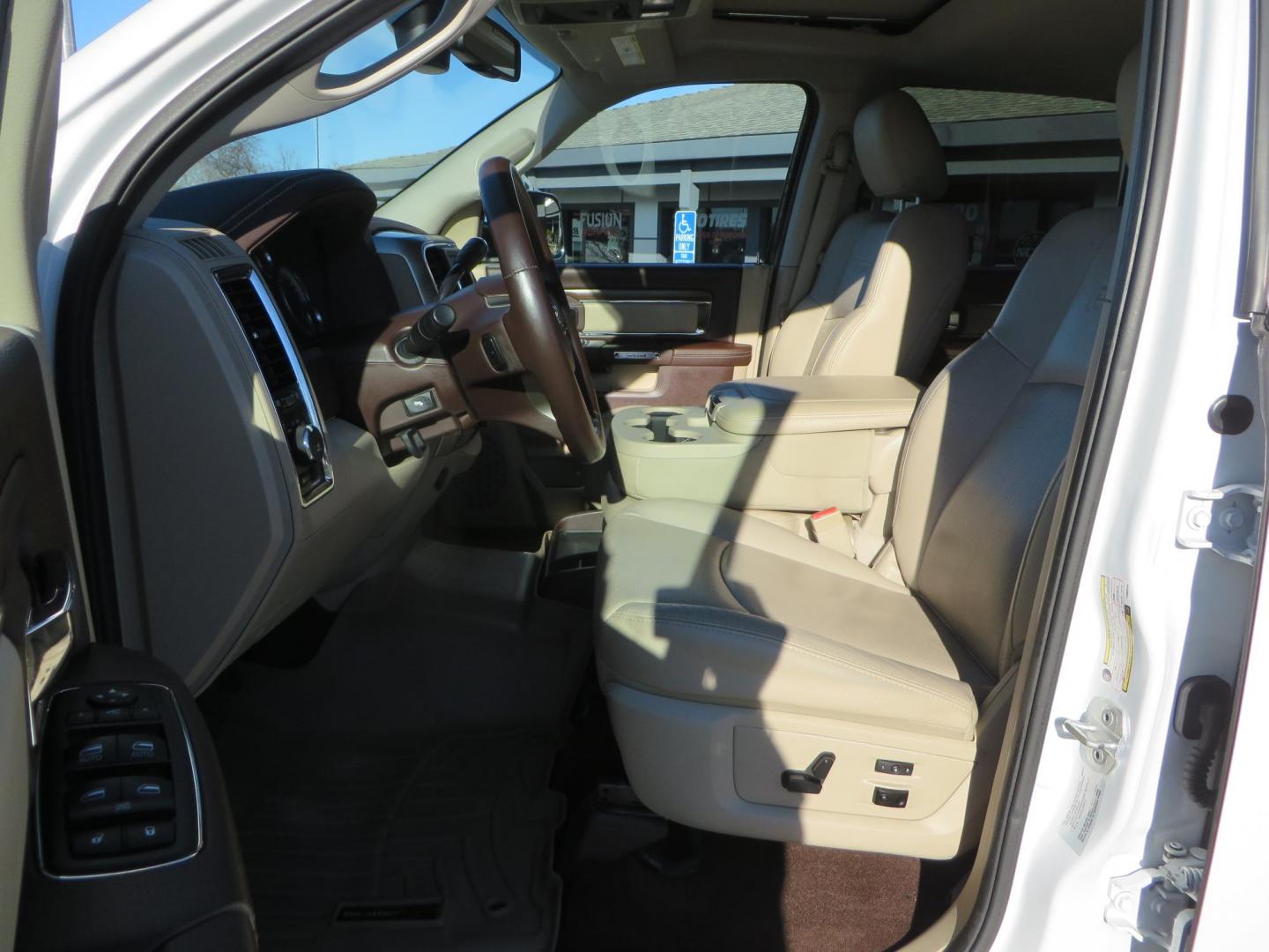 2015 White /Tan RAM 2500 Laramie Crew Cab LWB 4WD (3C6UR5KLXFG) with an 6.7L L6 OHV 24V TURBO DIESEL engine, 6-Speed Automatic transmission, located at 2630 Grass Valley Highway, Auburn, CA, 95603, (530) 508-5100, 38.937893, -121.095482 - Features- Thuren Suspension system, Fox 2.5 Performance Elite shocks, N-Fab runnign boards, Rimrock rear bumper, 20'' Fuel wheels, 35'' Nito Trail Grappler tires, Weathertech floor liners, and a Banks intake. - Photo#21