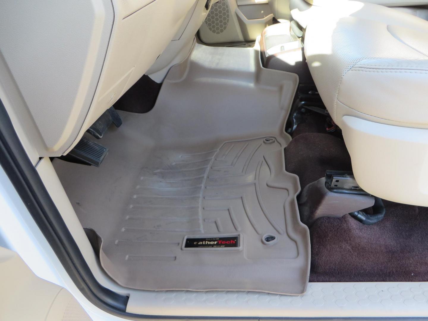 2015 White /Tan RAM 2500 Laramie Crew Cab LWB 4WD (3C6UR5KLXFG) with an 6.7L L6 OHV 24V TURBO DIESEL engine, 6-Speed Automatic transmission, located at 2630 Grass Valley Highway, Auburn, CA, 95603, (530) 508-5100, 38.937893, -121.095482 - Features- Thuren Suspension system, Fox 2.5 Performance Elite shocks, N-Fab runnign boards, Rimrock rear bumper, 20'' Fuel wheels, 35'' Nito Trail Grappler tires, Weathertech floor liners, and a Banks intake. - Photo#25