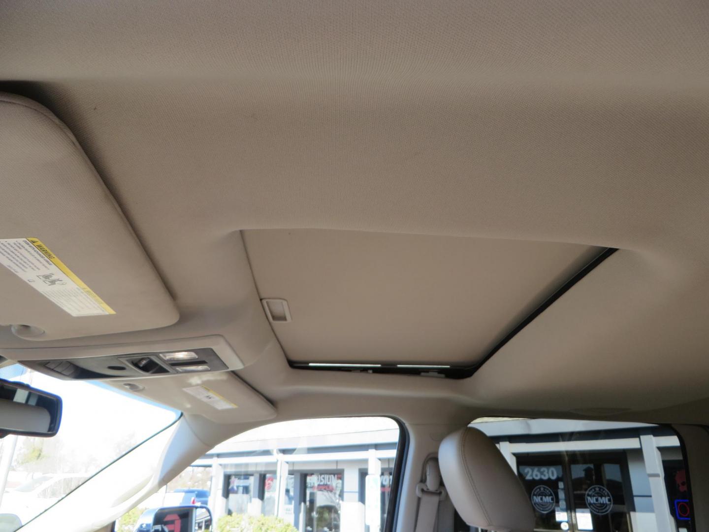 2015 White /Tan RAM 2500 Laramie Crew Cab LWB 4WD (3C6UR5KLXFG) with an 6.7L L6 OHV 24V TURBO DIESEL engine, 6-Speed Automatic transmission, located at 2630 Grass Valley Highway, Auburn, CA, 95603, (530) 508-5100, 38.937893, -121.095482 - Features- Thuren Suspension system, Fox 2.5 Performance Elite shocks, N-Fab runnign boards, Rimrock rear bumper, 20'' Fuel wheels, 35'' Nito Trail Grappler tires, Weathertech floor liners, and a Banks intake. - Photo#26