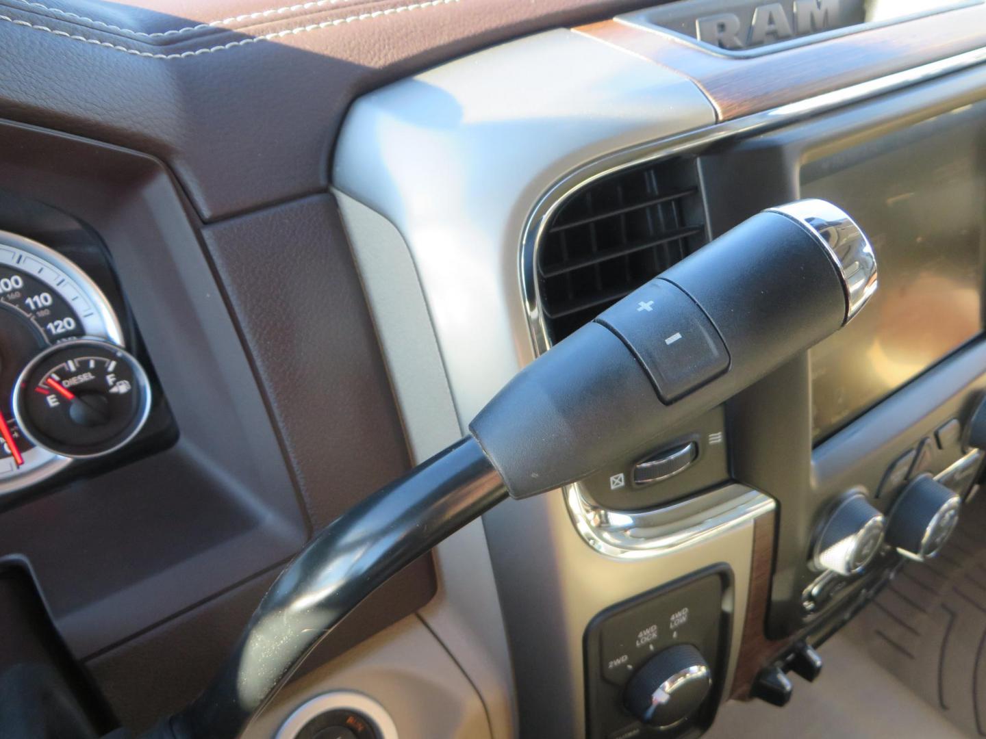 2015 White /Tan RAM 2500 Laramie Crew Cab LWB 4WD (3C6UR5KLXFG) with an 6.7L L6 OHV 24V TURBO DIESEL engine, 6-Speed Automatic transmission, located at 2630 Grass Valley Highway, Auburn, CA, 95603, (530) 508-5100, 38.937893, -121.095482 - Features- Thuren Suspension system, Fox 2.5 Performance Elite shocks, N-Fab runnign boards, Rimrock rear bumper, 20'' Fuel wheels, 35'' Nito Trail Grappler tires, Weathertech floor liners, and a Banks intake. - Photo#37