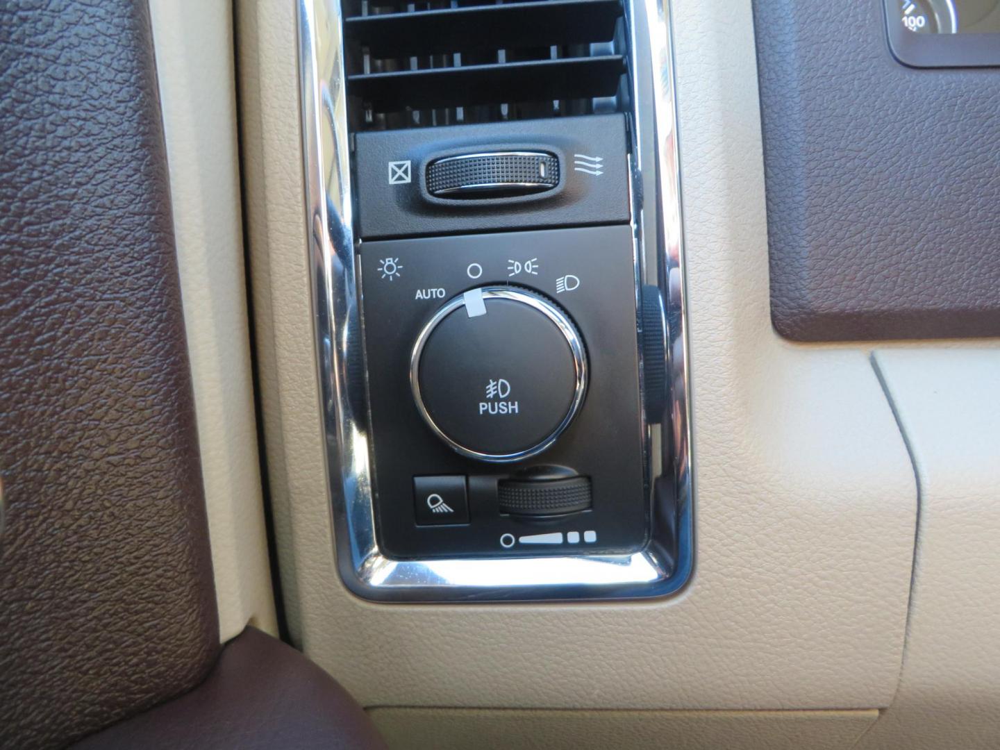 2015 White /Tan RAM 2500 Laramie Crew Cab LWB 4WD (3C6UR5KLXFG) with an 6.7L L6 OHV 24V TURBO DIESEL engine, 6-Speed Automatic transmission, located at 2630 Grass Valley Highway, Auburn, CA, 95603, (530) 508-5100, 38.937893, -121.095482 - Features- Thuren Suspension system, Fox 2.5 Performance Elite shocks, N-Fab runnign boards, Rimrock rear bumper, 20'' Fuel wheels, 35'' Nito Trail Grappler tires, Weathertech floor liners, and a Banks intake. - Photo#41