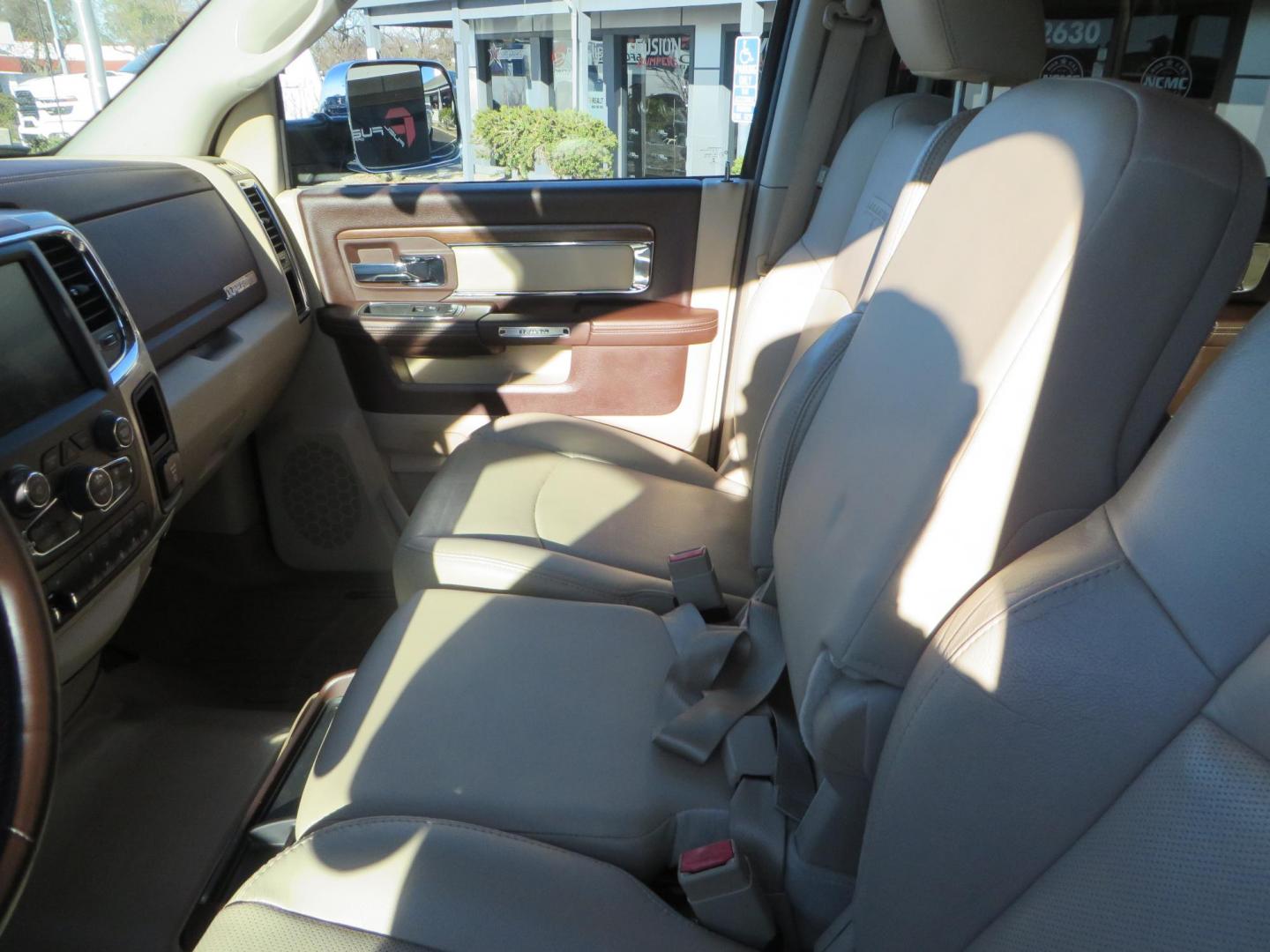 2015 White /Tan RAM 2500 Laramie Crew Cab LWB 4WD (3C6UR5KLXFG) with an 6.7L L6 OHV 24V TURBO DIESEL engine, 6-Speed Automatic transmission, located at 2630 Grass Valley Highway, Auburn, CA, 95603, (530) 508-5100, 38.937893, -121.095482 - Features- Thuren Suspension system, Fox 2.5 Performance Elite shocks, N-Fab runnign boards, Rimrock rear bumper, 20'' Fuel wheels, 35'' Nito Trail Grappler tires, Weathertech floor liners, and a Banks intake. - Photo#45