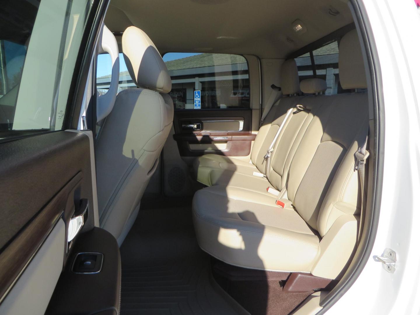 2015 White /Tan RAM 2500 Laramie Crew Cab LWB 4WD (3C6UR5KLXFG) with an 6.7L L6 OHV 24V TURBO DIESEL engine, 6-Speed Automatic transmission, located at 2630 Grass Valley Highway, Auburn, CA, 95603, (530) 508-5100, 38.937893, -121.095482 - Features- Thuren Suspension system, Fox 2.5 Performance Elite shocks, N-Fab runnign boards, Rimrock rear bumper, 20'' Fuel wheels, 35'' Nito Trail Grappler tires, Weathertech floor liners, and a Banks intake. - Photo#49