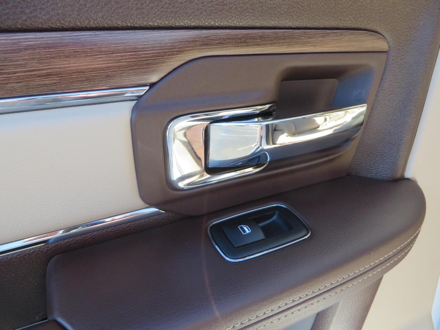 2015 White /Tan RAM 2500 Laramie Crew Cab LWB 4WD (3C6UR5KLXFG) with an 6.7L L6 OHV 24V TURBO DIESEL engine, 6-Speed Automatic transmission, located at 2630 Grass Valley Highway, Auburn, CA, 95603, (530) 508-5100, 38.937893, -121.095482 - Features- Thuren Suspension system, Fox 2.5 Performance Elite shocks, N-Fab runnign boards, Rimrock rear bumper, 20'' Fuel wheels, 35'' Nito Trail Grappler tires, Weathertech floor liners, and a Banks intake. - Photo#48