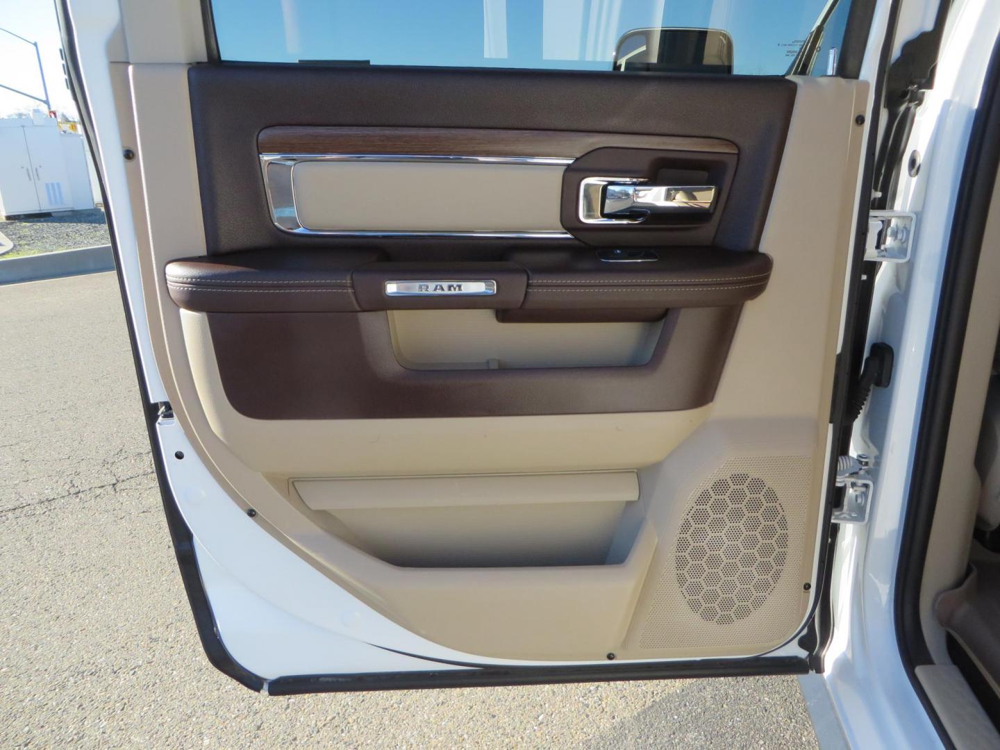 2015 White /Tan RAM 2500 Laramie Crew Cab LWB 4WD (3C6UR5KLXFG) with an 6.7L L6 OHV 24V TURBO DIESEL engine, 6-Speed Automatic transmission, located at 2630 Grass Valley Highway, Auburn, CA, 95603, (530) 508-5100, 38.937893, -121.095482 - Features- Thuren Suspension system, Fox 2.5 Performance Elite shocks, N-Fab runnign boards, Rimrock rear bumper, 20'' Fuel wheels, 35'' Nito Trail Grappler tires, Weathertech floor liners, and a Banks intake. - Photo#47