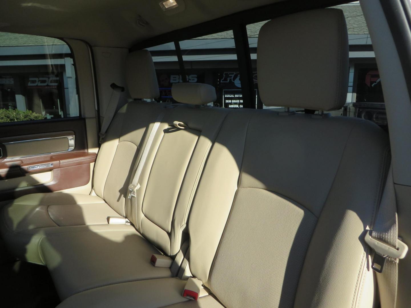 2015 White /Tan RAM 2500 Laramie Crew Cab LWB 4WD (3C6UR5KLXFG) with an 6.7L L6 OHV 24V TURBO DIESEL engine, 6-Speed Automatic transmission, located at 2630 Grass Valley Highway, Auburn, CA, 95603, (530) 508-5100, 38.937893, -121.095482 - Features- Thuren Suspension system, Fox 2.5 Performance Elite shocks, N-Fab runnign boards, Rimrock rear bumper, 20'' Fuel wheels, 35'' Nito Trail Grappler tires, Weathertech floor liners, and a Banks intake. - Photo#50