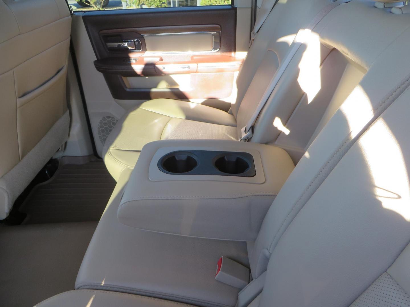 2015 White /Tan RAM 2500 Laramie Crew Cab LWB 4WD (3C6UR5KLXFG) with an 6.7L L6 OHV 24V TURBO DIESEL engine, 6-Speed Automatic transmission, located at 2630 Grass Valley Highway, Auburn, CA, 95603, (530) 508-5100, 38.937893, -121.095482 - Features- Thuren Suspension system, Fox 2.5 Performance Elite shocks, N-Fab runnign boards, Rimrock rear bumper, 20'' Fuel wheels, 35'' Nito Trail Grappler tires, Weathertech floor liners, and a Banks intake. - Photo#53