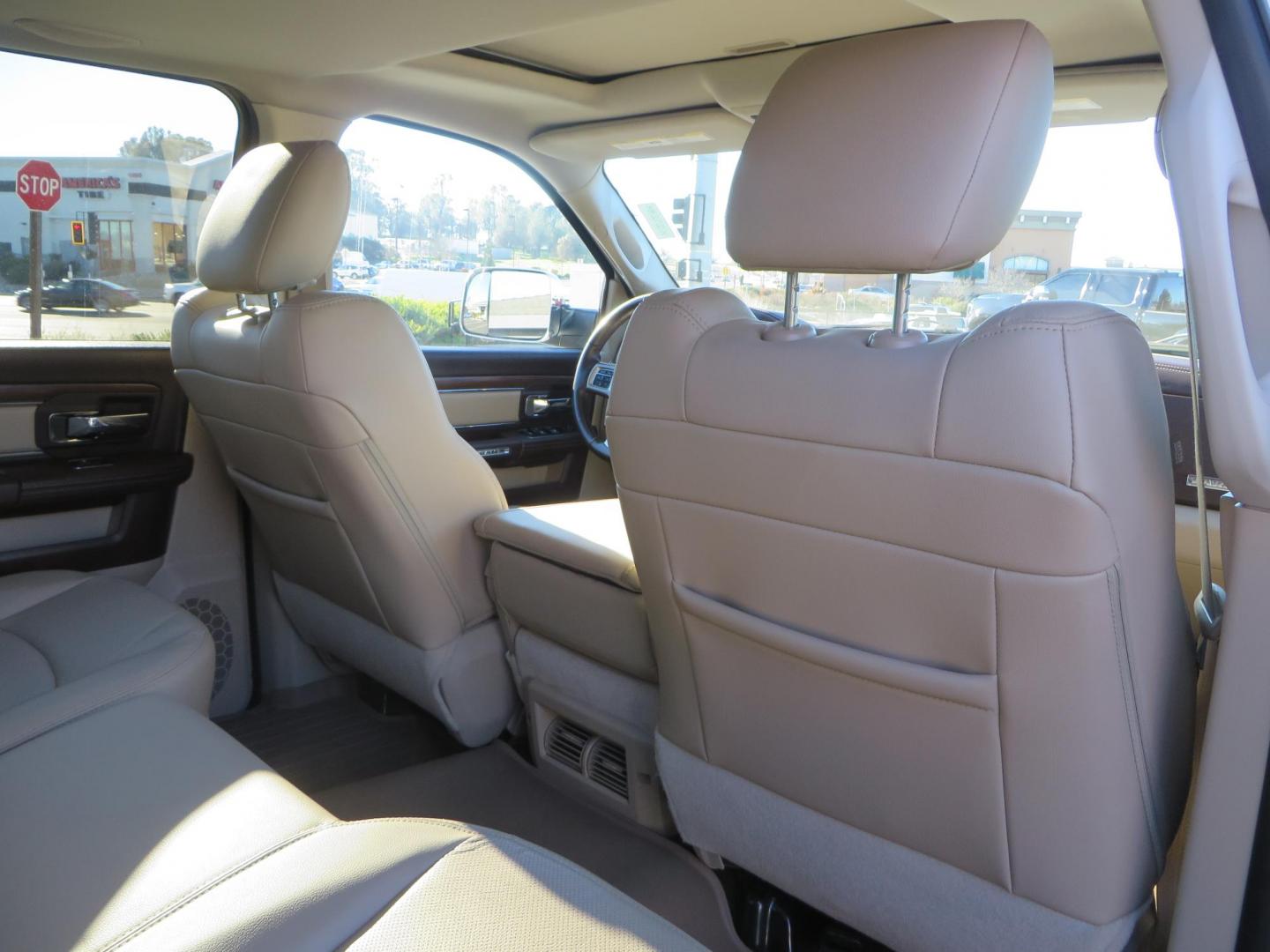 2015 White /Tan RAM 2500 Laramie Crew Cab LWB 4WD (3C6UR5KLXFG) with an 6.7L L6 OHV 24V TURBO DIESEL engine, 6-Speed Automatic transmission, located at 2630 Grass Valley Highway, Auburn, CA, 95603, (530) 508-5100, 38.937893, -121.095482 - Features- Thuren Suspension system, Fox 2.5 Performance Elite shocks, N-Fab runnign boards, Rimrock rear bumper, 20'' Fuel wheels, 35'' Nito Trail Grappler tires, Weathertech floor liners, and a Banks intake. - Photo#68