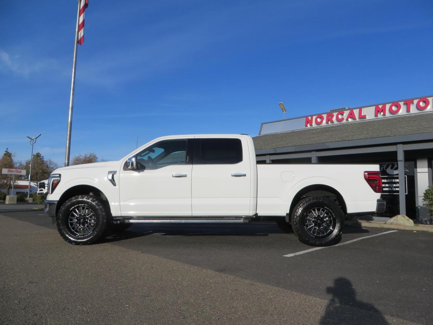 2024 White Ford F-150 Lariat SuperCrew 4WD (1FTFW5L56RF) with an 5.0L V8 OHV 16V engine, 6A transmission, located at 2630 Grass Valley Highway, Auburn, CA, 95603, (530) 508-5100, 38.937893, -121.095482 - New Level kit, 20'' Gear Alloy 764BM wheels, and Toyo Open Country AT3 tires. - Photo#1