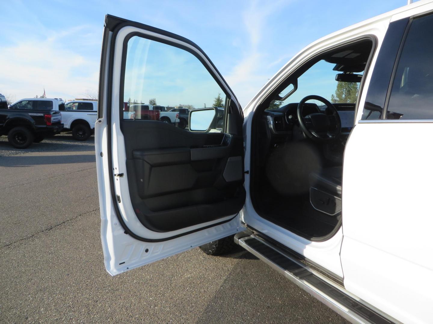 2024 White Ford F-150 Lariat SuperCrew 4WD (1FTFW5L56RF) with an 5.0L V8 OHV 16V engine, 6A transmission, located at 2630 Grass Valley Highway, Auburn, CA, 95603, (530) 508-5100, 38.937893, -121.095482 - New Level kit, 20'' Gear Alloy 764BM wheels, and Toyo Open Country AT3 tires. - Photo#17