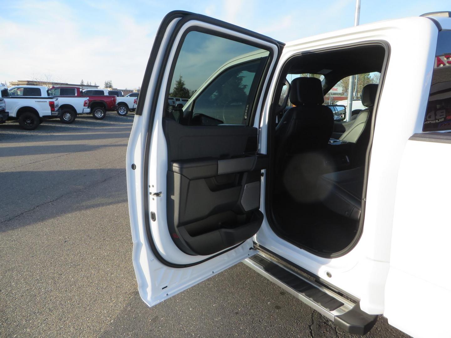 2024 White Ford F-150 Lariat SuperCrew 4WD (1FTFW5L56RF) with an 5.0L V8 OHV 16V engine, 6A transmission, located at 2630 Grass Valley Highway, Auburn, CA, 95603, (530) 508-5100, 38.937893, -121.095482 - New Level kit, 20'' Gear Alloy 764BM wheels, and Toyo Open Country AT3 tires. - Photo#41